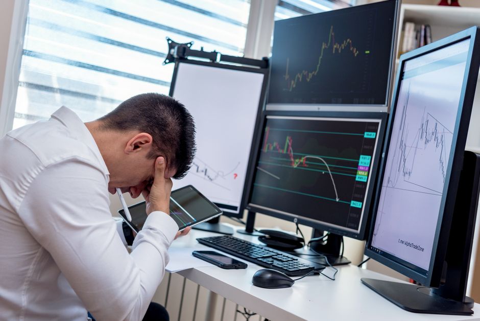 Crypto prop firm trading in South Korea, trader analysing charts on multiple monitors
